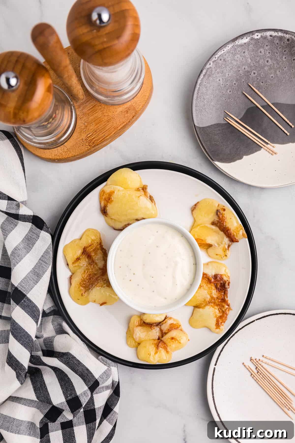 Crispy Blackstone Cheese Curds Recipe for Crowd-Pleasing Snack 5 Blackstone Cheese Curds on plate with dipping sauce
