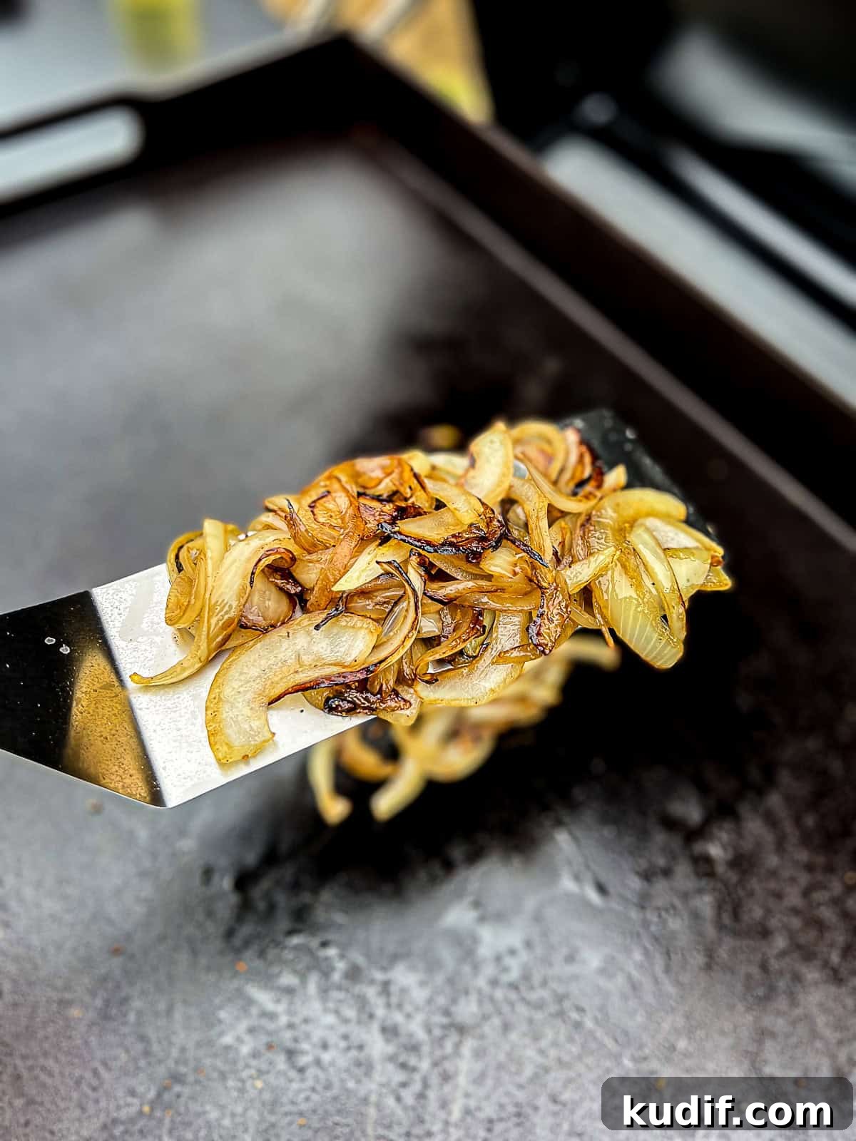 Crispy Griddle-Fried Onions: Technique for Even Caramelization 3 Frying onion on the griddle