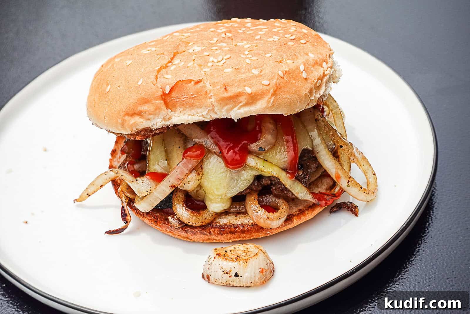 Crispy Griddle-Fried Onions: Technique for Even Caramelization 4 Griddled burger with fried onions