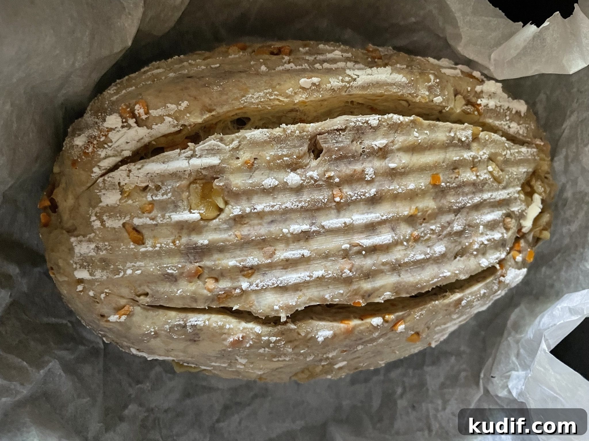 Scored walnut and citrus sourdough bread. Scored walnut and citrus sourdough bread.
