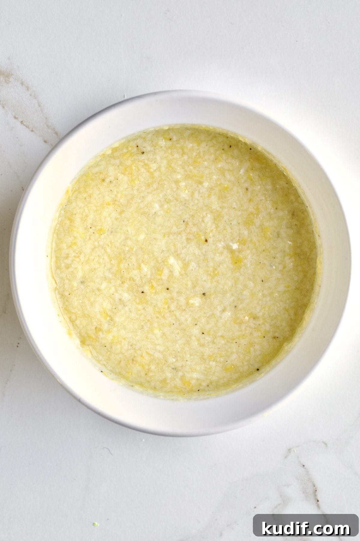 Creamy Lemon Butter Pasta Recipe (Pasta al Limone) 7 Parmigiano and olive oil mixture in a bowl.