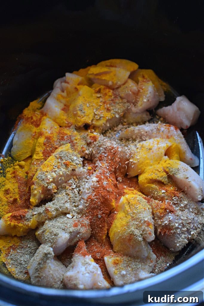 adding ingredients to slow cooker
