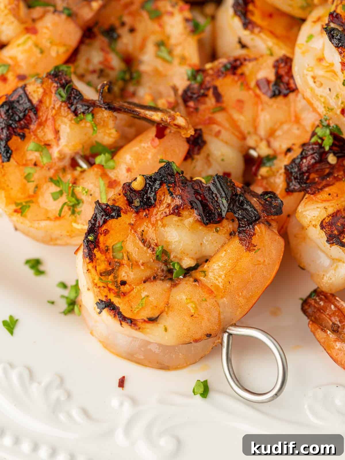 Garlic Grilled Shrimp Kabobs Recipe for Summer BBQ 7 Closeup of zesty grilled garlic shrimp skewers.