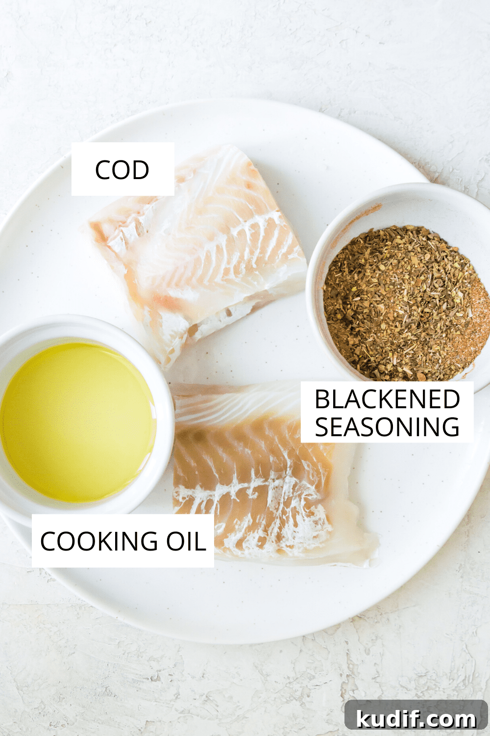 A plate full of the ingredients needed to make blackened cod.