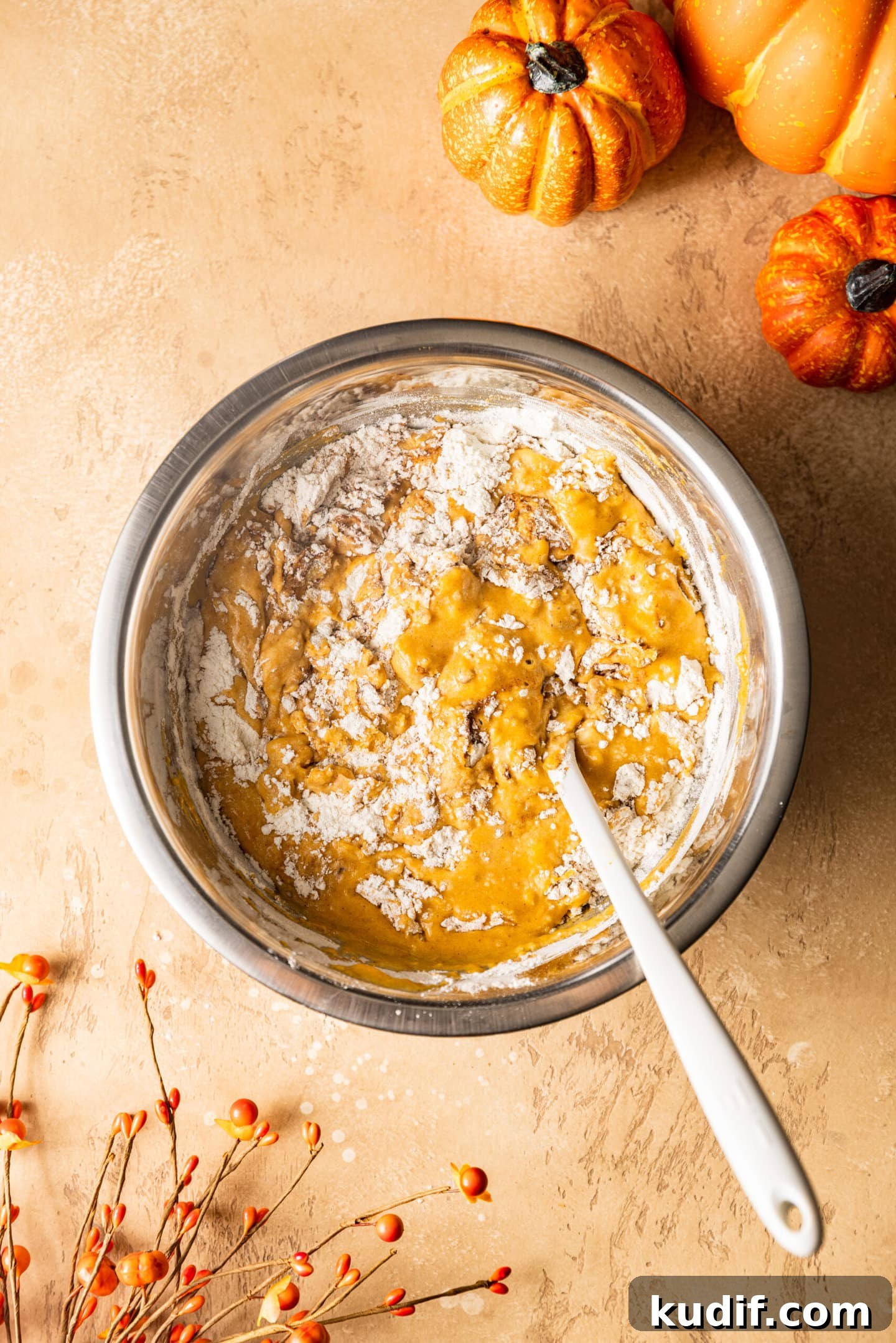 Maple-Glazed Pumpkin Bread Recipe for Fall Baking 5 Pumpkin bread batter being mixed