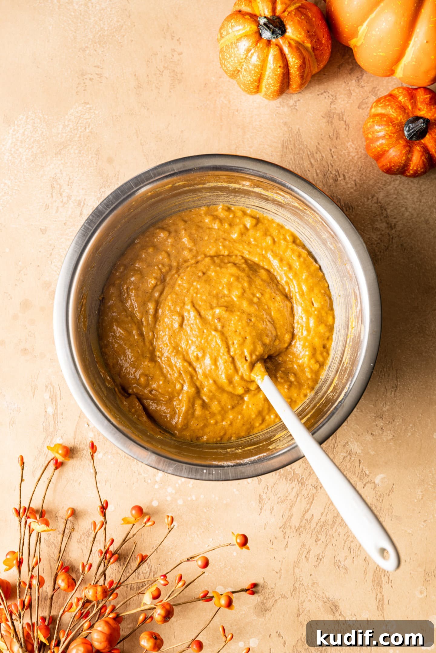 Maple-Glazed Pumpkin Bread Recipe for Fall Baking 6 Pumpkin bread batter in bowl