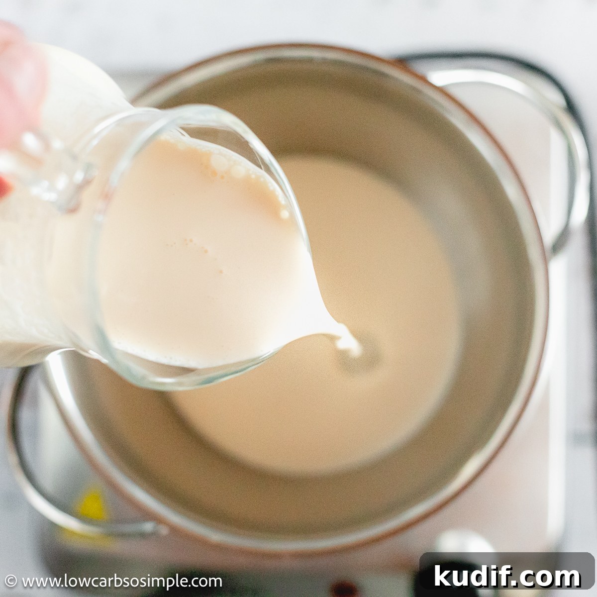 Keto Carnivore Blue Cheese Ice Cream Recipe 3 Pouring HWC into a Saucepan | Low-Carb, So Simple
