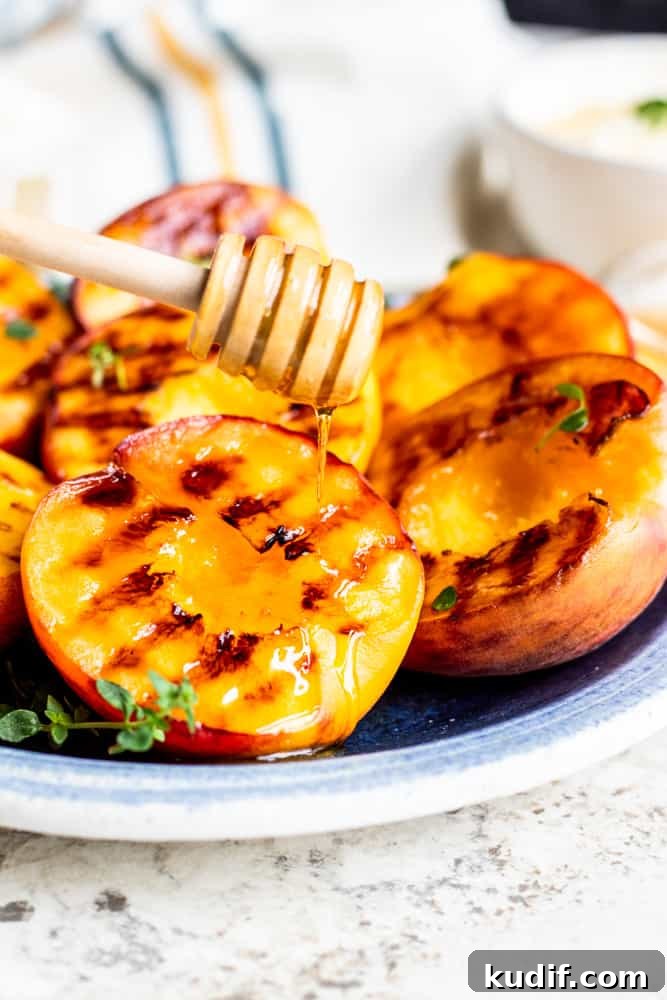 Cooked peaches drizzled with honey Cooked peaches with honey drizzle