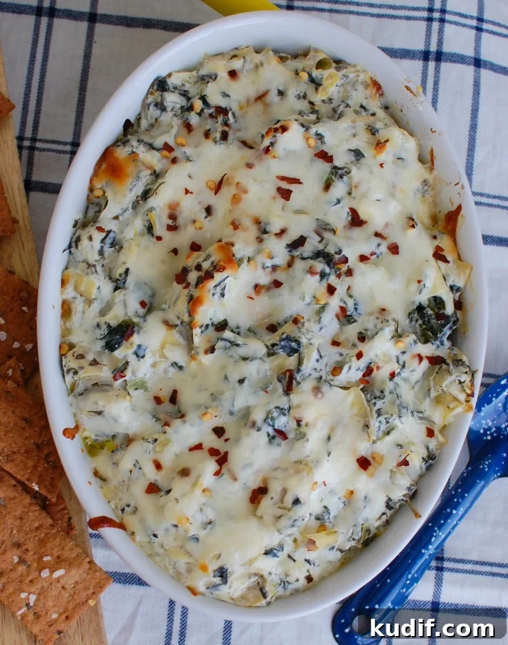 Lemony Spinach and Artichoke Dip Recipe for Parties 3 Lemon Spinach Artichoke Dip in white dish