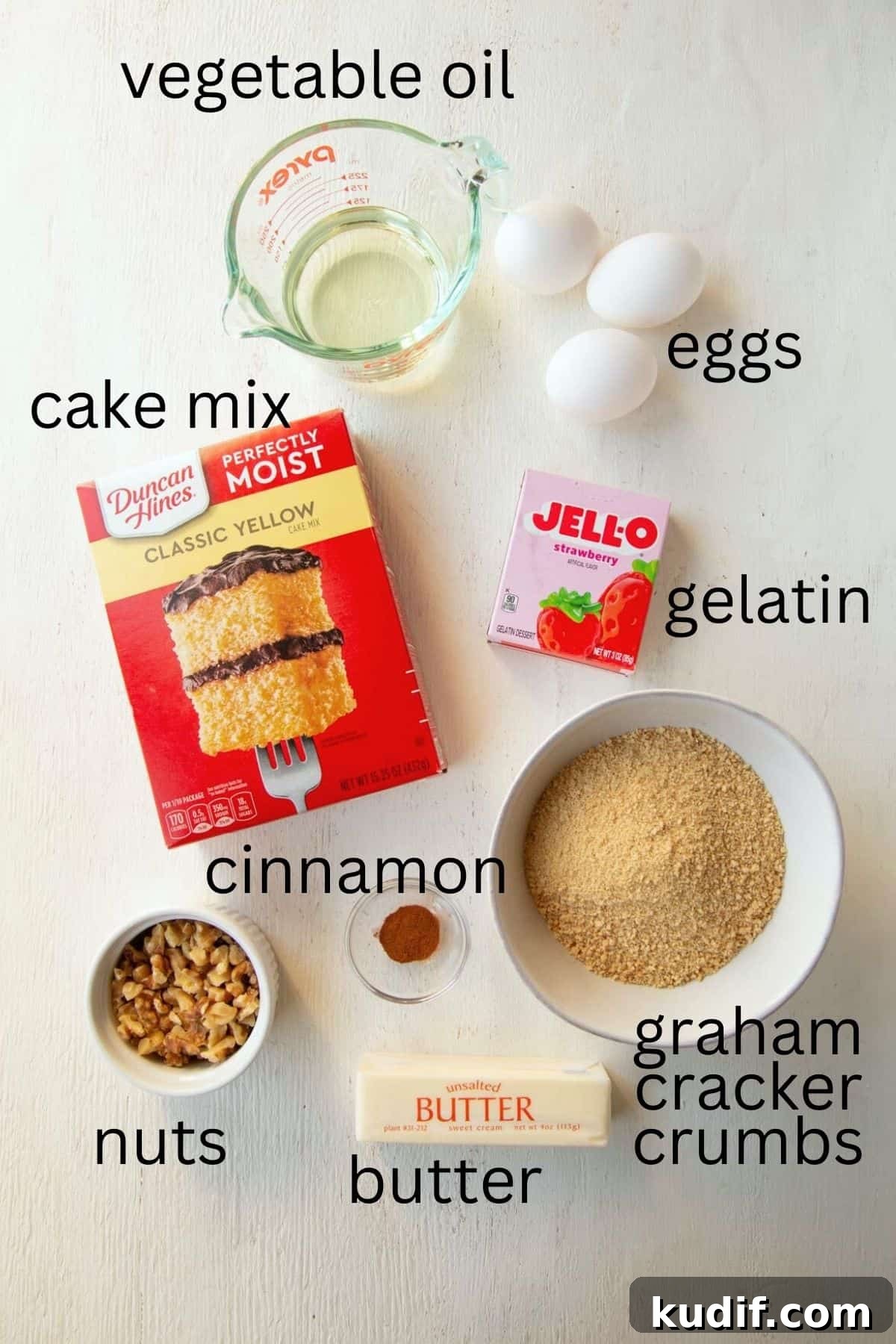 Strawberry Graham Poke Cake Recipe with Creamy Filling 4 jello, cake mix, graham cracker crumbs, and other ingredients.