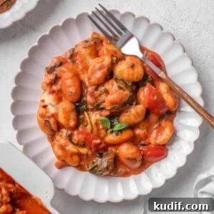 Baked gnocchi served on a plate.