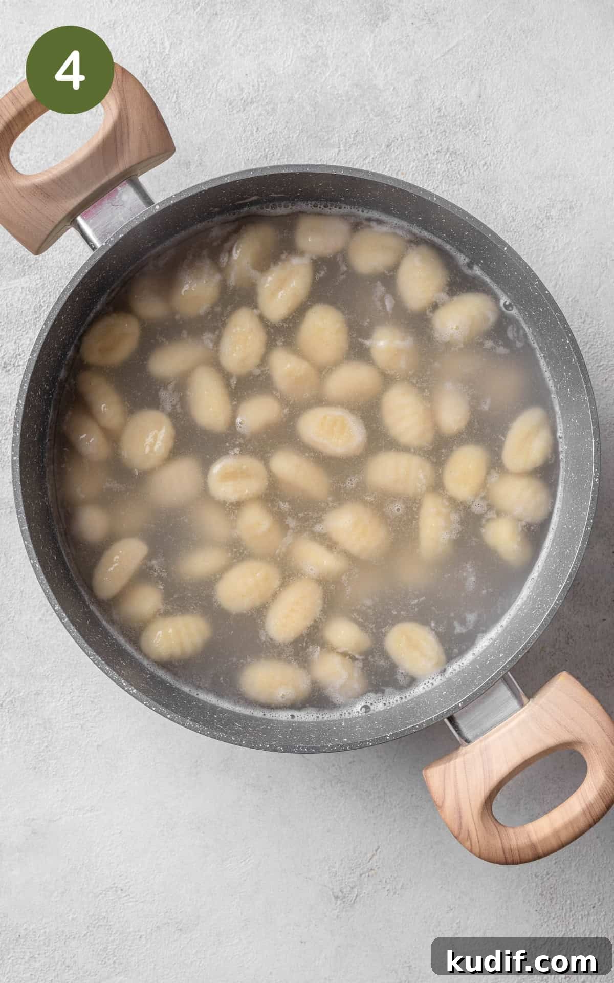 Gnocchi boiling in a saucepan.