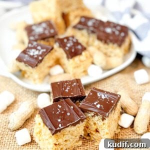 Peanut Butter Rice Krispie Treats Recipe for Gooey, Crunchy Squares 10 Peanut butter rice krispie treats, covered in chocolate.