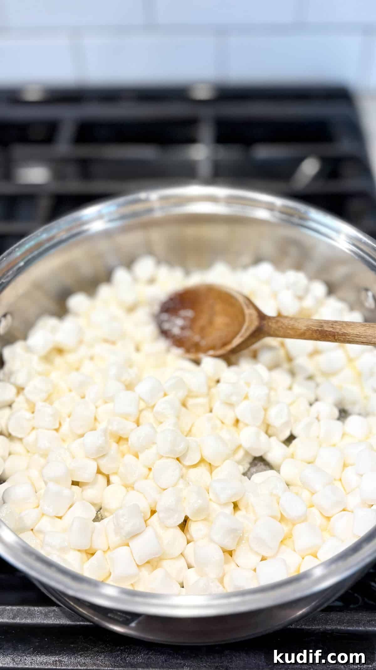 Peanut Butter Rice Krispie Treats Recipe for Gooey, Crunchy Squares 7 Marshmallows added to pan.