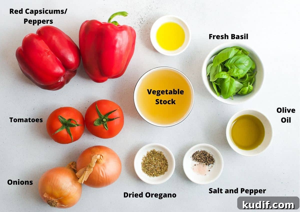Roasted Red Pepper Soup Recipe — Creamy Roasted Capsicum Soup 3 ingredients in this recipe on a white background.