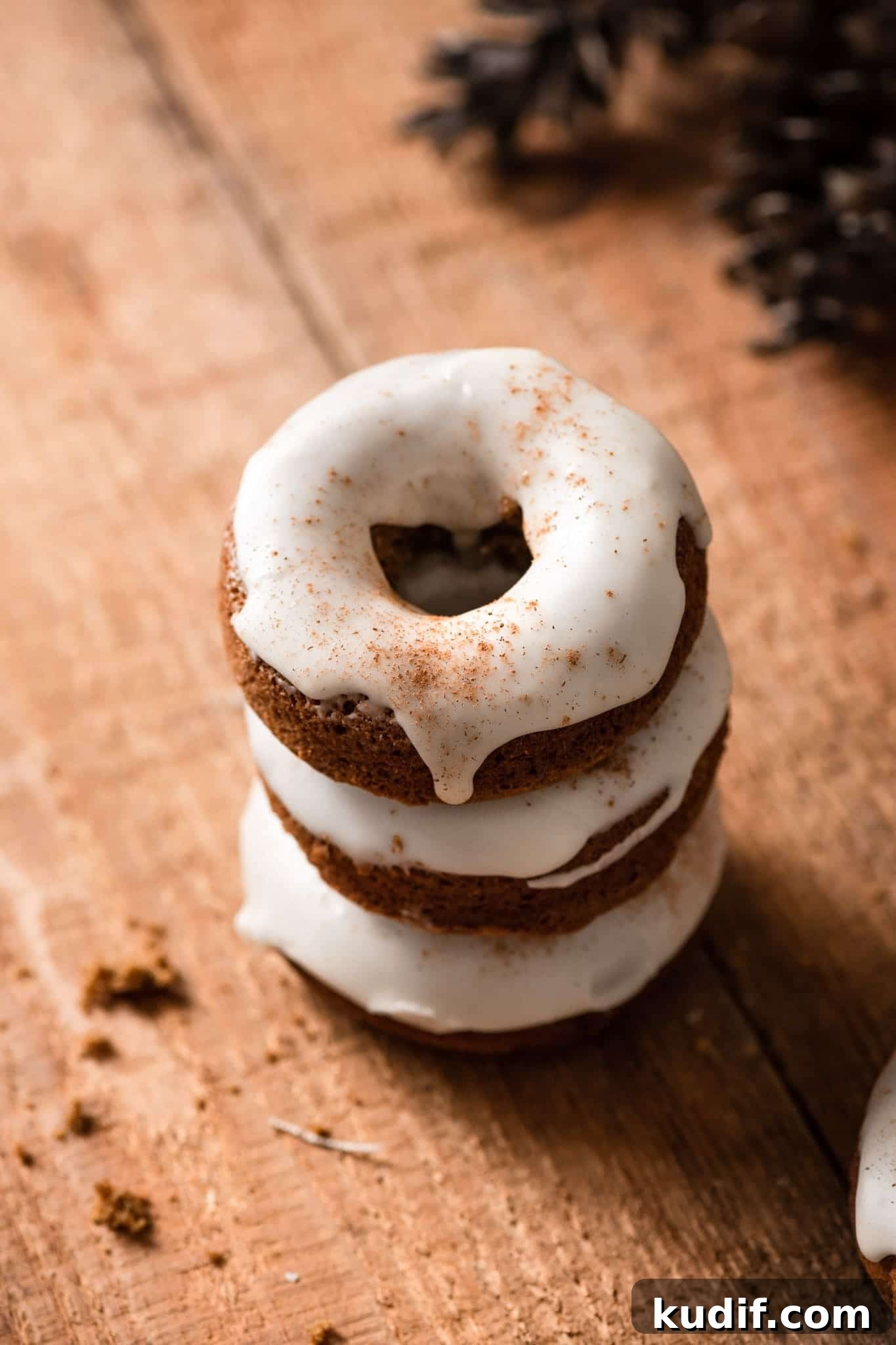 Baked Gingerbread Donuts with Vanilla Glaze 3 Stack of Homemade Baked Gingerbread Doughnut Recipe.