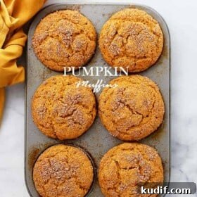 Fresh baked pumpkin muffins in a muffin tray