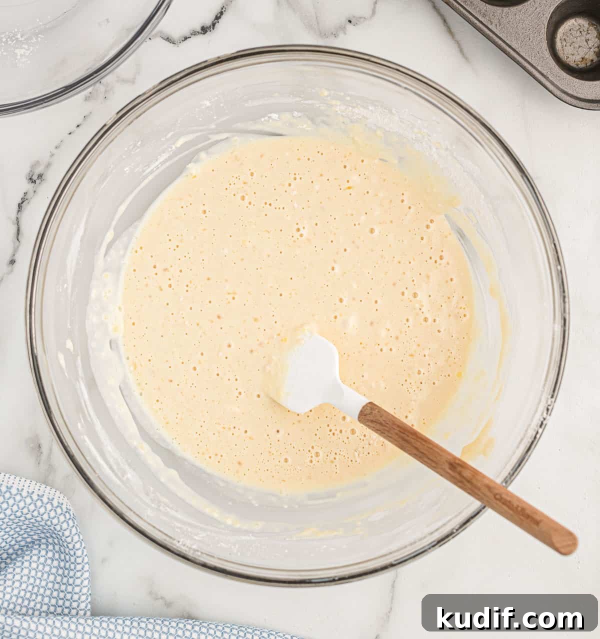 Fluffy Pancake Mini Muffins: Bite-Sized Breakfast Treats 7 pancake batter in a bowl