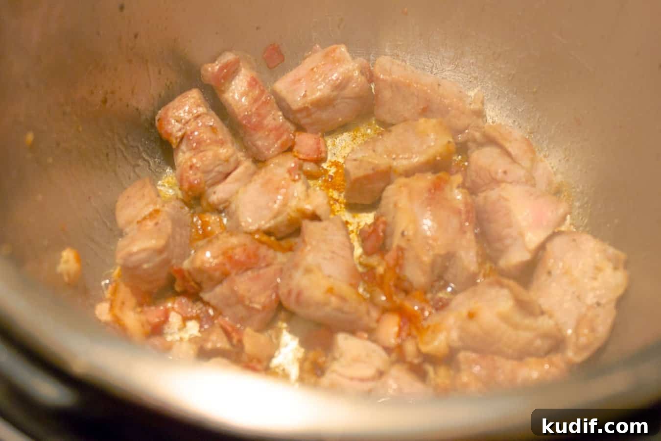 Instant Pot Red Pork Chili Recipe — Quick Pressure Cooker Meal 5 Pork and bacon being browned for Instant Pot Pressure Cooker Red Pork Chili