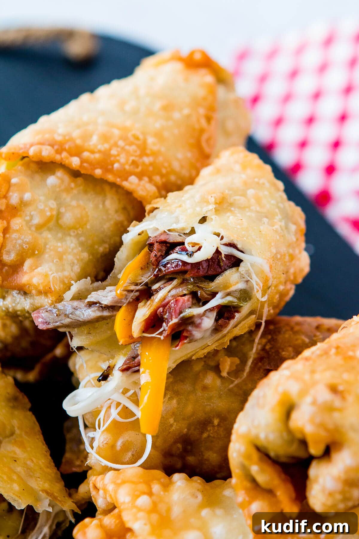 Cheesy, crunchy egg rolls that taste like a philly cheesesteak? Heck. Yes! Philly Cheesesteak Egg Rolls ohsweetbasil.com