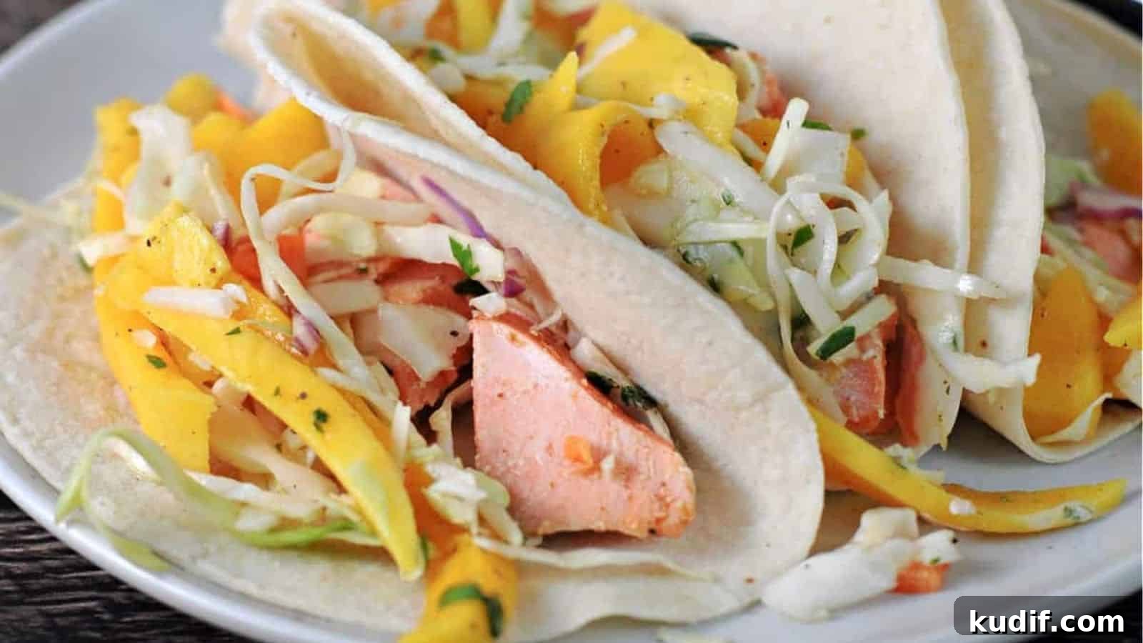 23 Quick Seafood Dinners for Any Night of the Week 4 BBQ Salmon Tacos with Slaw