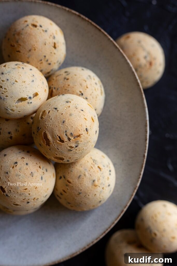 Korean Mochi Bread Recipe: Chewy, Crispy Toasted Rice Cake Guide 11 Korean mochi breads stacked on a plate.