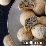 Korean Mochi Bread Recipe: Chewy, Crispy Toasted Rice Cake Guide 12 A Korean mochi bread cut open to show interior texture.