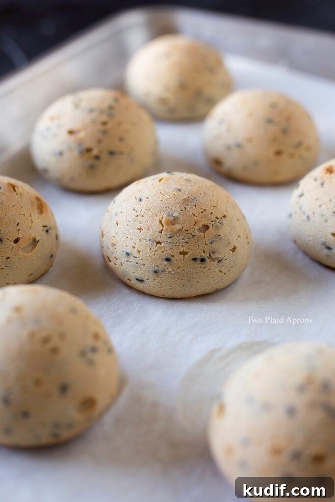 Korean Mochi Bread Recipe: Chewy, Crispy Toasted Rice Cake Guide 4 Close up view of Korean mochi breads on a sheet pan.