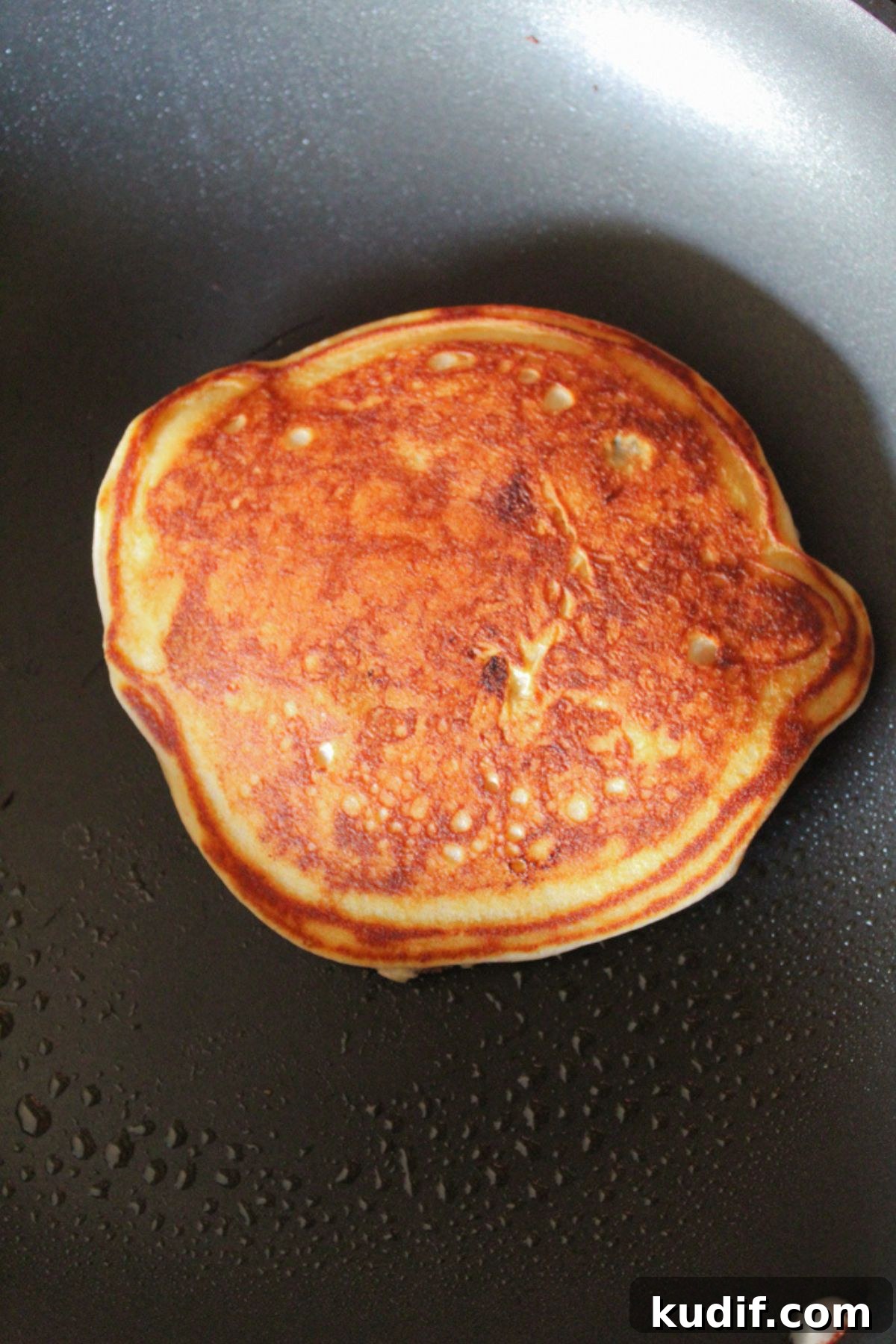 Gluten-Free Blueberry Pancake Recipe That Flips Perfectly 7 pancake flipped in a skillet