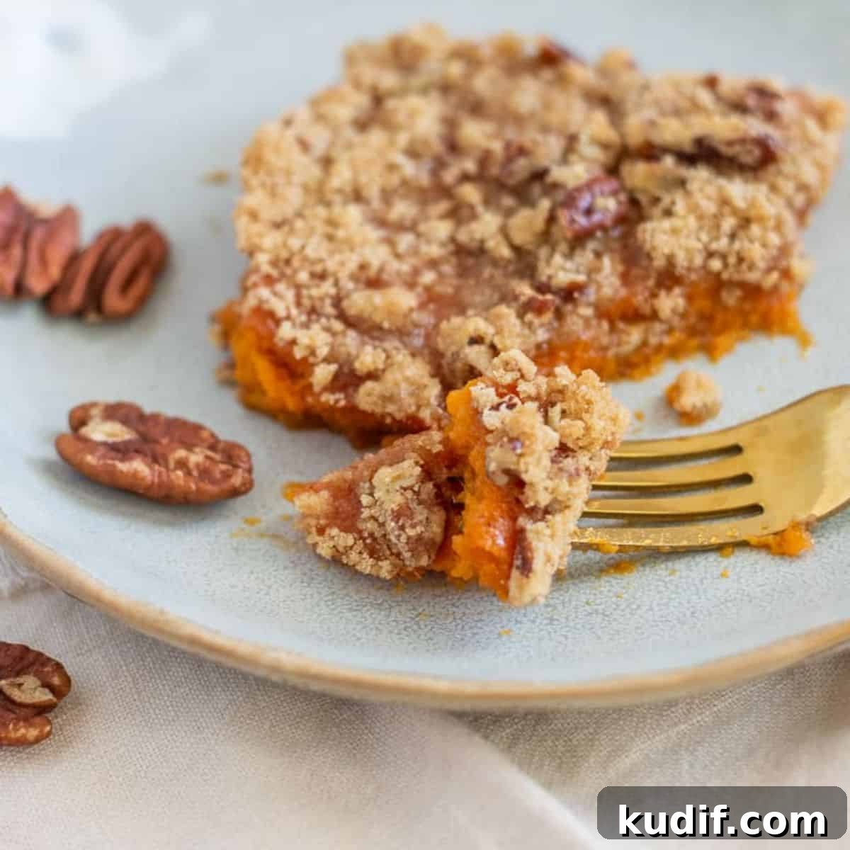 40+ Thanksgiving Dishes That Start with S: Sides, Staples & Sweets 3 gluten free sweet potato casserole on a plate