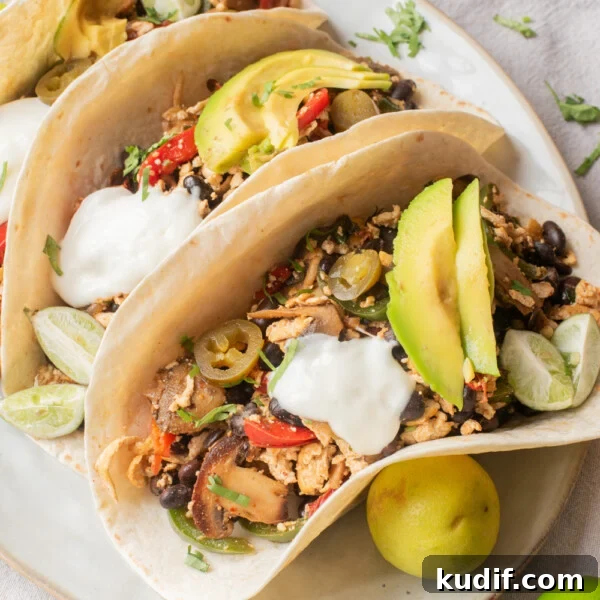 Smoky Black Bean Stuffed Peppers with Cilantro Lime Rice 12 Vegan tofu fajitas served in soft flour tortillas with avocado slices, black beans, sautéed vegetables, and vegan sour cream