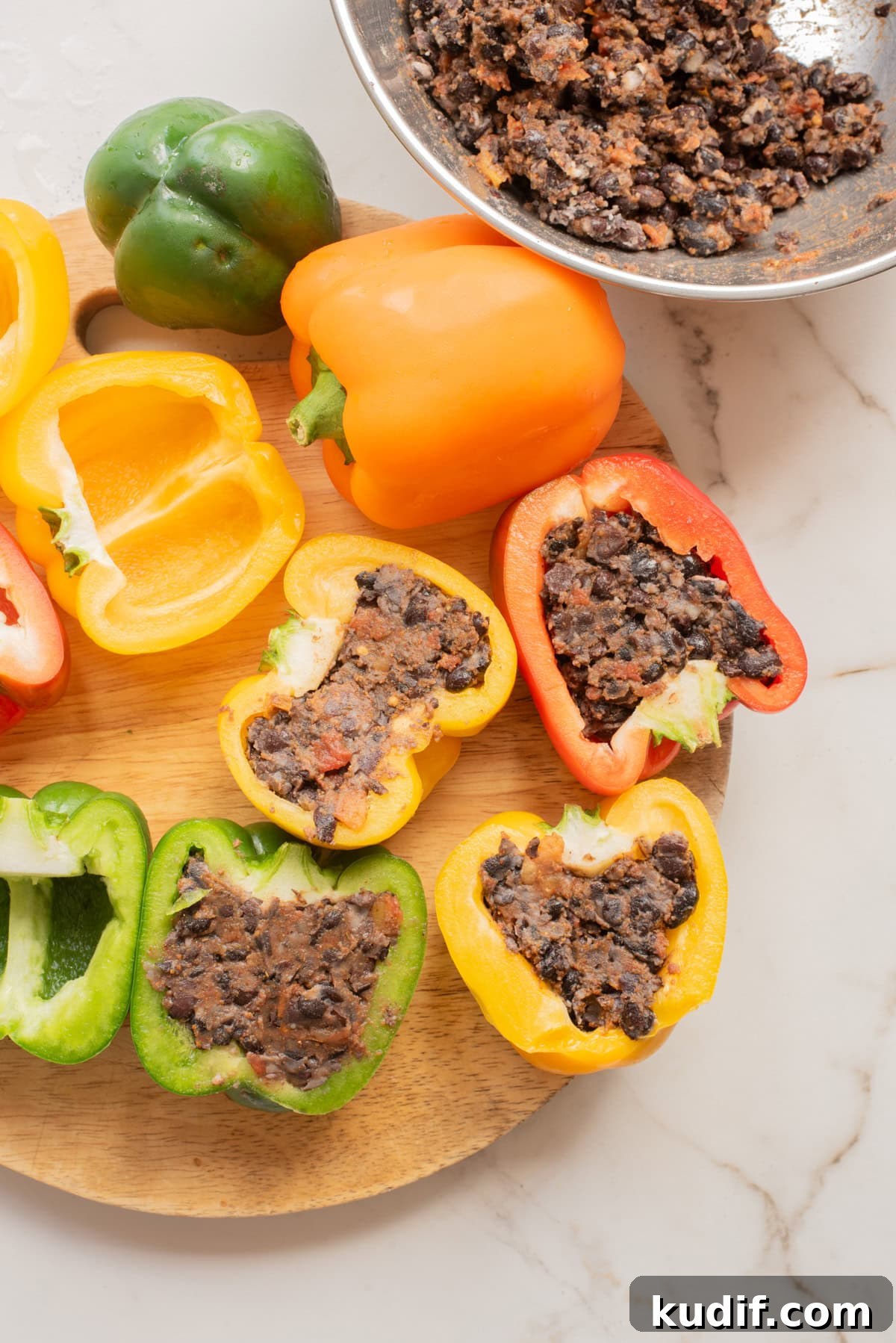 Smoky Black Bean Stuffed Peppers with Cilantro Lime Rice 7 Bell pepper halves filled with black bean stuffed pepper mixture.