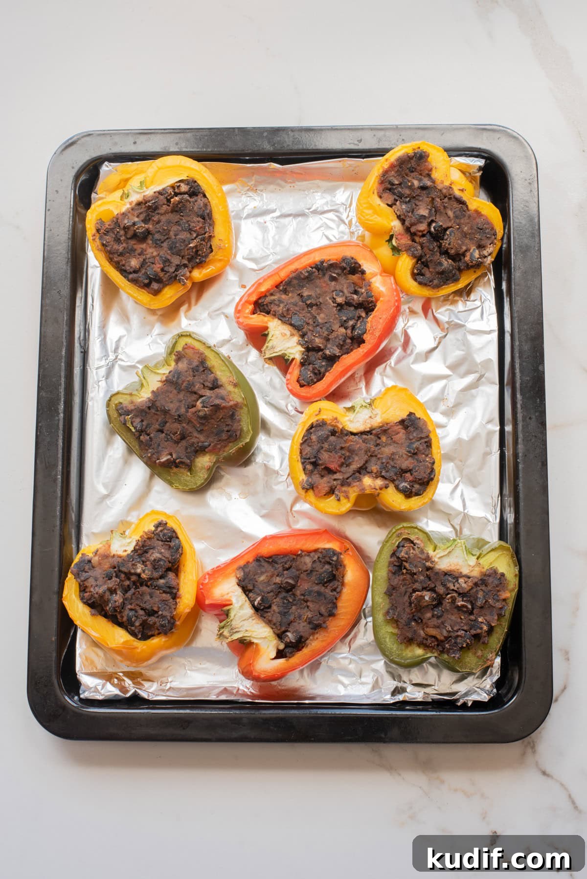Smoky Black Bean Stuffed Peppers with Cilantro Lime Rice 8 Tray of black bean stuffed peppers.