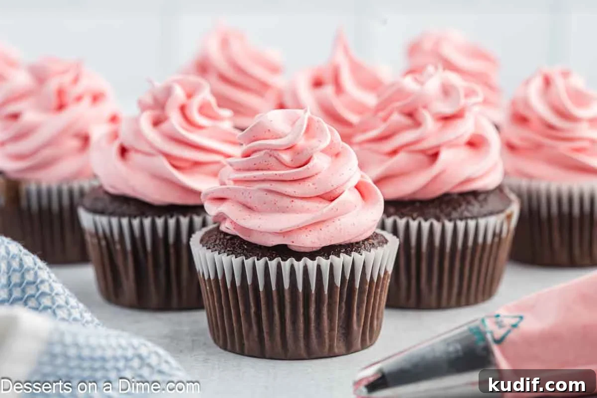 Gelatin Frosting Recipe: Smooth, Vibrant Jello Icing Ideas 2 Jello Frosting on chocolate cupcakes arranged together.