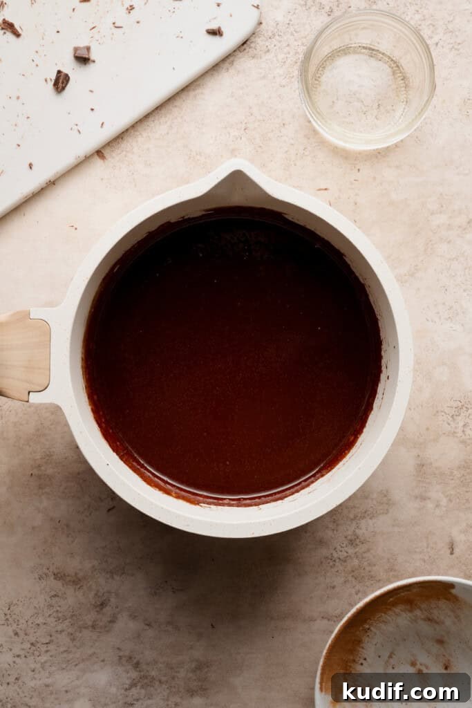 A pot of the melted butter and chocolate mixture.