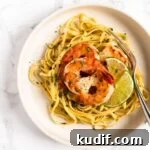 Cilantro-Lime Shrimp Pasta with Garlic and Parmesan 11 a top down view of a plate of cilantro lime shrimp pasta