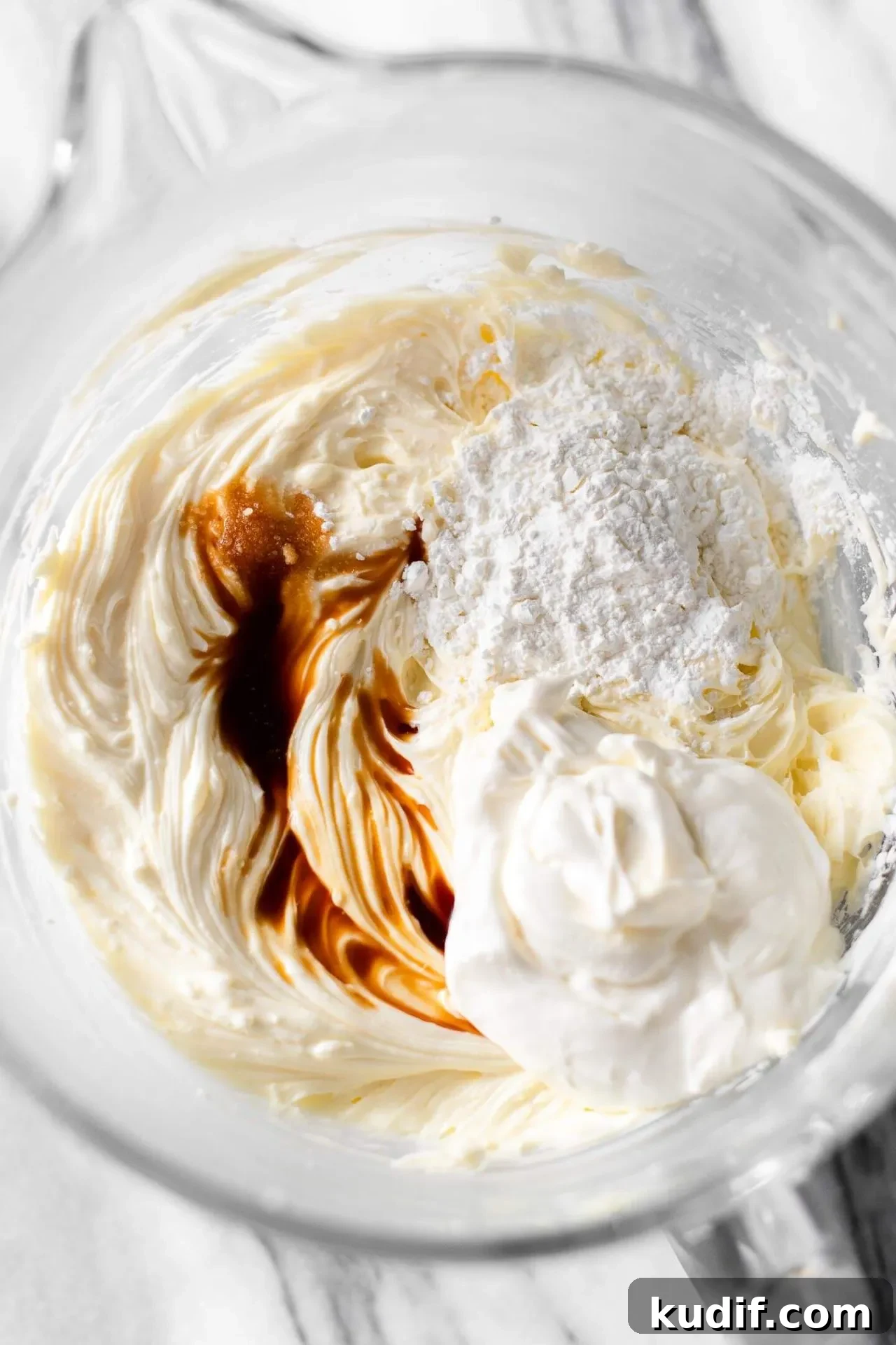 Oreo Cheesecake Recipe: Creamy No-Bake Dessert with Oreo Crust 6 Oreo cheesecake sour cream, cornstarch, vanilla, and salt added to bowl with cream cheese mixture