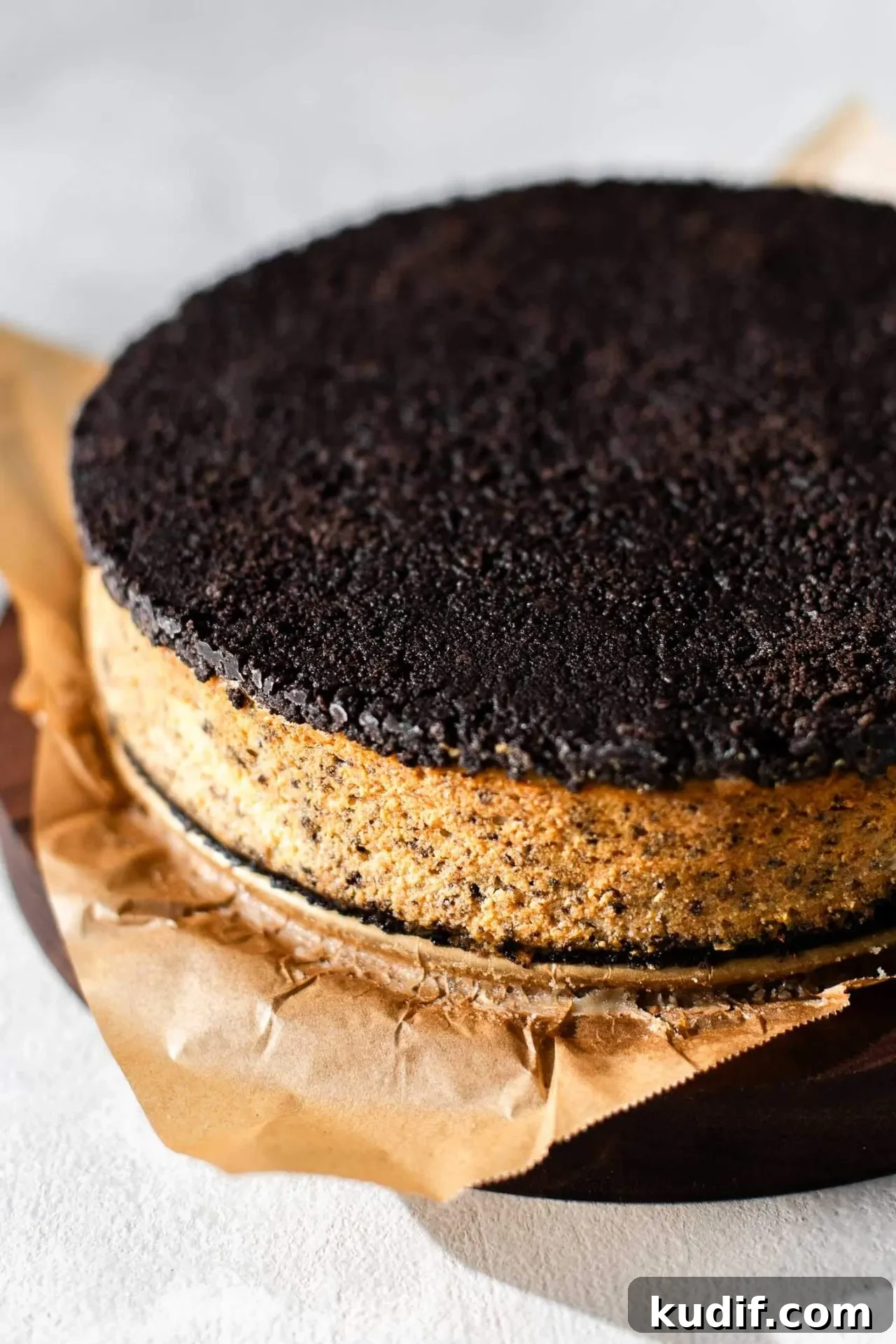 Oreo Cheesecake Recipe: Creamy No-Bake Dessert with Oreo Crust 9 Oreo cheesecake second crust pressed on top of baked cheesecake