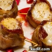 scallopes wrapped in bacon on a stick