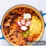 chicken chili served with radishes and chips