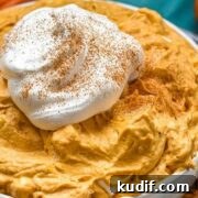 pumpkin fluff served with a dollop of whipped cream