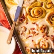 sweet rolls made with maple and bacon in a square baking dish