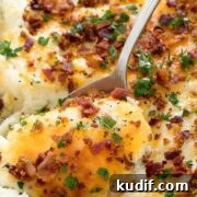 a close up of loaded mashed potatoes
