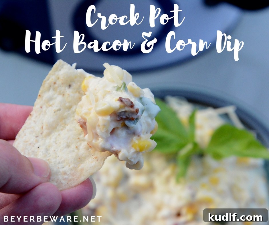Slow-Cooker Bacon and Corn Dip Recipe for Party Appetizers 7 Close-up of the ooey-gooey dip on a chip.