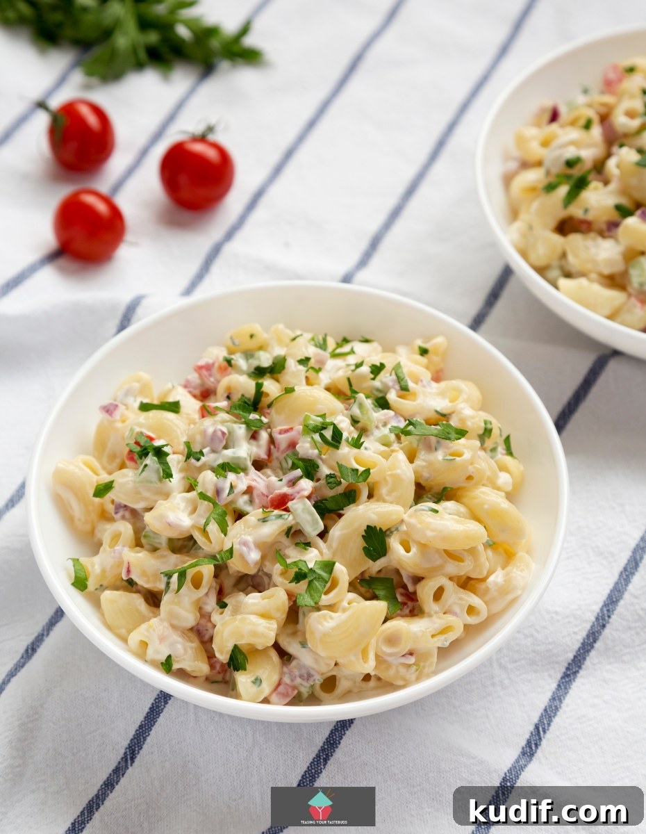 Creamy Bacon & Tomato Macaroni Salad Recipe 5 Bacon and Tomato Macaroni Salad, an easy pasta salad recipe using bacon, tomato, celery and macaroni with a simple mayonnaise dressing. An ideal pasta side dish.