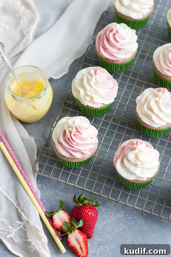 Strawberry Lemonade Cupcakes on a wire rack