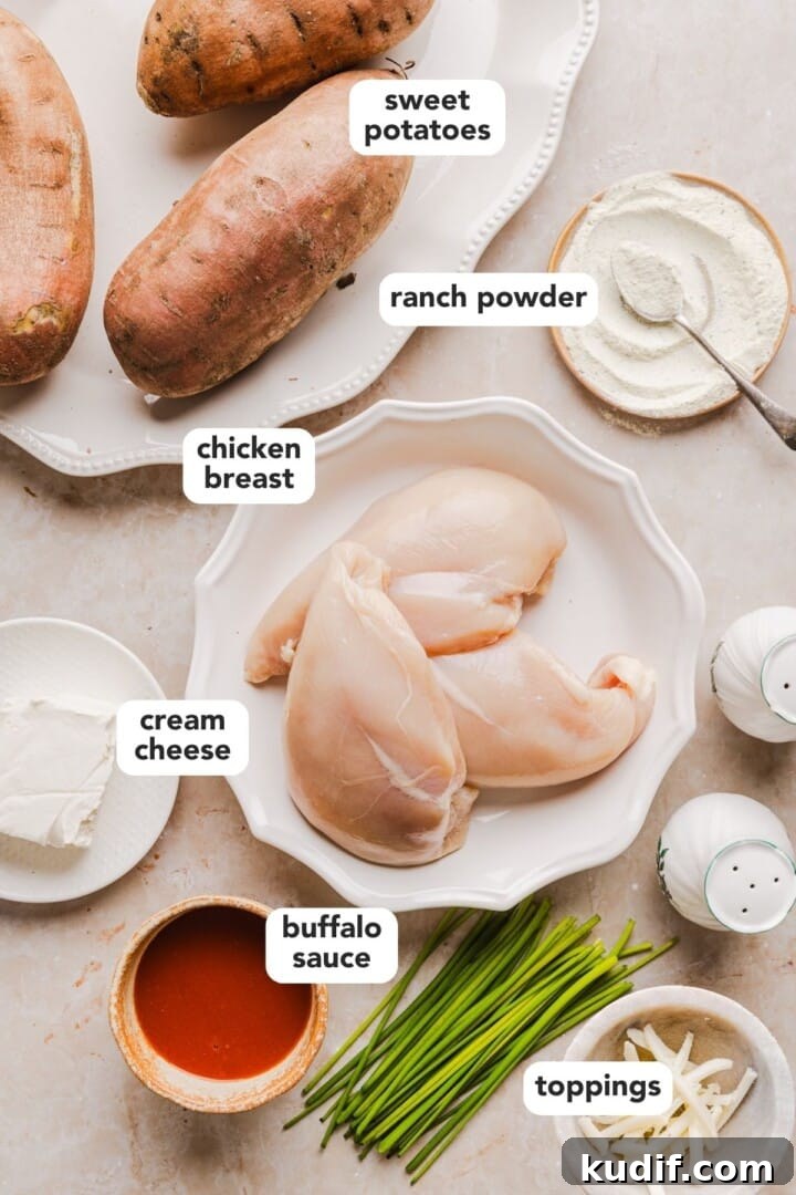 Buffalo Chicken Stuffed Sweet Potatoes Recipe for Spicy Weeknight Meals 3 Ingredients for buffalo chicken sweet potatoes in small bowls on a marble counter.