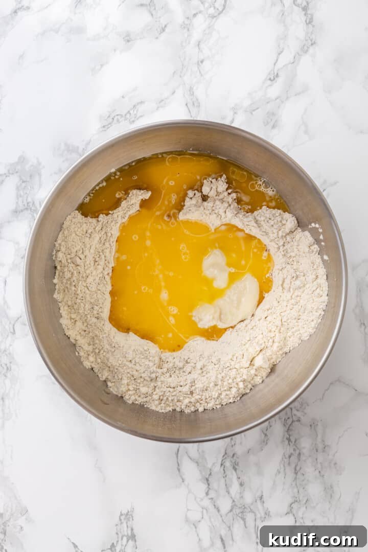 Combine the wet and dry ingredients. Combine the wet and dry ingredients.