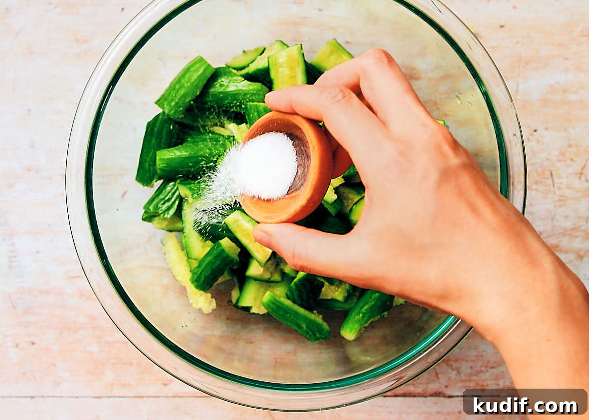 Spicy Cucumber Salad Recipe: Quick Tangy Side Dish 7 Sprinkling salt on cucumbers before draining.