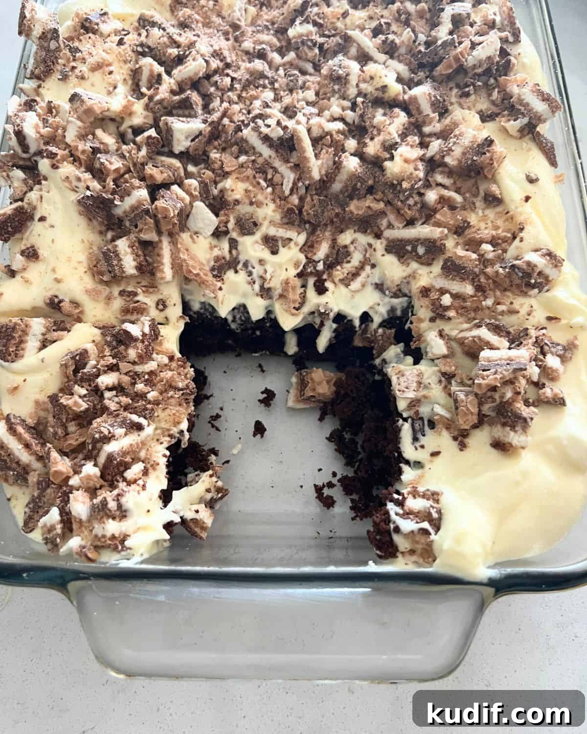 Decadent Pudding Cake Recipe (Even Better Than Sex Cake) 2 Better than Sex cake topped with vanilla pudding frosting and crushed up wafer cookies.